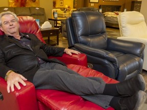 Sutherlands Furniture owner Gus Dupuis may not be putting his feet up when his east London furniture store closes mid-May. (Mike Hensen/The London Free Press)