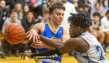Beal's J C Cruz loses the ball on the baseline as he's guarded by Laurier's Daniel Anane during their WOSSAA AAA senior boys semi-final played at Laurier on Wednesday February 26, 2020. Last week in the city final, Beal won 79-59, but Beal coach Brian Harvey said, "it's tough to beat a team twice in a row, and their home gym is worth 10pts."
And it was, after trailing throughout the first half, a rousing third quarter had the teams tied at 33 heading into the fourth.
The fourth didn't disappoint with Laurier's raucous home gym keeping the team fired up, with Beal leading 47-46 with 4.4 seconds to play, a basket made it 49-46 with 3 seconds and then a technical foul made it 50-46 for the final.
Beal will face CCH in the WOSSAA AAA final.
Mike Hensen/The London Free Press/Postmedia Network