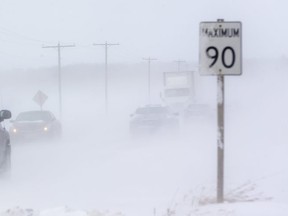 Strong westerly winds kicked up severe drifting snow at times causing near whiteout conditions north of London.  (Mike Hensen/The London Free Press)