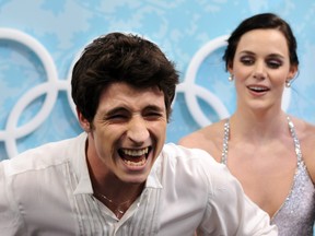Ilderton's Scott Moir and Tessa Virtue of London react as they listen to the judge's scores during the 2010 Vancouver Olympics, when they won ice dance gold for Canada and began a lively run as international sports celebrities. (YURI KADOBNOV /AFP/Getty Images)