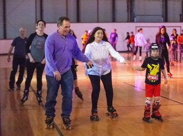 Rick and Kim Needham roller skate with their nephew Jake Bernier (6) at the North London Optimist Community Centre in London, Ont. on Sunday February 16, 2020. The centre hosts roller skating each Saturday and Sunday from 1 to 4 p.m. They will also be holding a special Family Day skate on Monday from 1 to 4 p.m. Skate rental is available. Derek Ruttan/The London Free Press/Postmedia Network