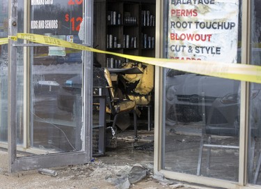 An explosion and fire at Universal Kuts barbershop caused $750,000 in a strip mall at the corner of Commissoners Road and Adelaide Street in London, Ont. on Sunday Feb. 16, 2020. Derek Ruttan/The London Free