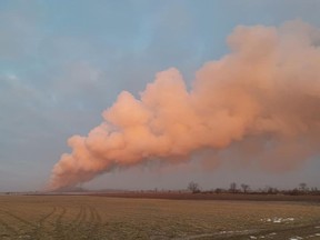 Fire crews battle a massive fire at a pig farm near Tillsonburg on Saturday, Feb. 1, 2020. The owners told fire crews there are 6,000 pigs in the barn, estimating damage will be between $8 million and $10 million.