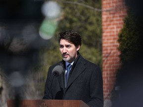 Canadian Prime Minister Justin Trudeau speaks during a news conference on COVID-19 situation in Canada from his residence on March 16, 2020 in Ottawa, Canada. - Prime Minister Justin Trudeau announced that Canada is closing its borders to foreign travellers, except Americans, in order to slow the spread of the new coronavirus.