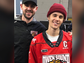 Pop superstar Justin Bieber posted this photo on Instagram with Joey Hishon, a fellow Stratford native and Owen Sound Attack legend, while wearing the OHL team's jersey. Justin Bieber/Instagram