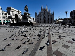 The square in front of the cathedral in Milan, Italy, is occupied almost exclusively by pigeons this week amid a nationwide lockdown aimed at slowing the the spread of COVID-19 outbreak. (Reuters)