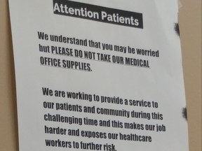 A notice at the walk-in clinic at Church and Carlton Sts. asks patients not to steal their medical supplies during the pandemic. REDDIT