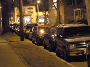 Cars are parked at night on Hyman Street near downtown London in this Free Press file photo.
