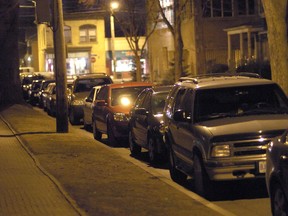 Cars are parked at night on Hyman Street near downtown London in this Free Press file photo.