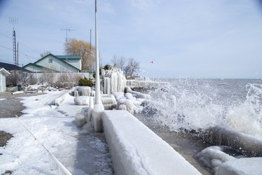 Lake Erie slams into structures on Erie Shore Drive in Chatham-Kent, Ont. on Sunday March 1, 2020. Residents of Erie Shore Drive have a deadline of March 9 to vacate their properties so that repairs can be made to the dike on top of which the road sits. Derek Ruttan/The London Free Press/Postmedia Network