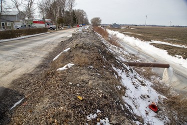 Erie Shore Drive in Chatham-Kent, Ont. sits on a dike separating the Lake Erie from farmland.   Residents of Erie Shore Drive have a deadline of March 9 to vacate their properties so that repairs can be made to the dike on top of which the road sits. Photo shot on Sunday March 1, 2020.Derek Ruttan/The London Free Press/Postmedia Network