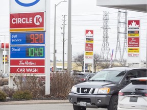 The Esso and Petro Canada gas stations at Wellington and Exeter roads in London were selling gasoline for 92 cents a litre on Wednesday. (Derek Ruttan/The London Free Press)