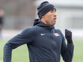 Eyeing this summer's Tokyo Olympc Summer Games, London decathlete Damian Warner does a 200 m training run on the TD Stadium track at Western University in London on Wednesday, March 11. (Derek Ruttan/The London Free Press)
