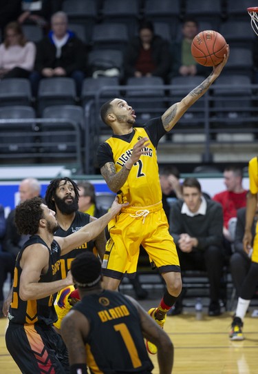 The London Lightning's Xavier Moon lays up two points against the Sudbury Fiveduring their NBL game at Budweiser Gardens in London on Wednesday. (Derek Ruttan/The London Free Press)