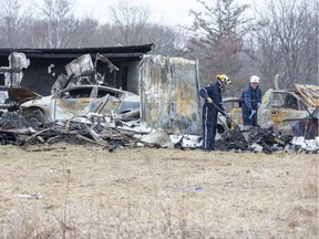 The Ontario Fire Marshal is investigating a barn fire at 4195 Bostwick Rd. in London, Ont. on Thursday March 12, 2020. Seven cars  stored in the barn were destroyed. (Derek Ruttan/The London Free Press)