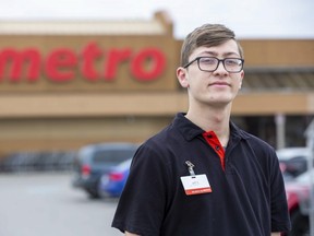 Justin Arcese has been working extra shifts stocking produce at the Metro grocery store on the corner of Trafalgar Street and Gore Road in London. Derek Ruttan/The London Free Press/Postmedia Network