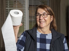 Anne Murphy has written a poem entitled "The Toilet Paper Frenzy". It was inspired by the recent spate of panic buying of toilet paper. She was photographed in London, Ont. on Friday March 20, 2020. (Derek Ruttan/The London Free Press)