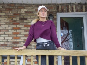 Ericka Tymkin has been laid-off from her job as a server at the popular Richmond Row bar and restaurant, Toboggan. (Derek Ruttan/The London Free Press)