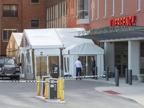 A tent has been erected at the emergency entrance of St. Thomas Elgin General Hospital to create more space for patients entering the hospital. (DEREK RUTTAN, The London Free Press)