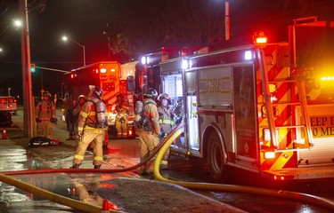 Firefighters were called to 446 King Street in London, Ont. on Friday March 27, 2020 to put out a 4th floor apartment fire. One person was taken to the hospital with unknown injuries from the fire that began around 8:00pm.  Derek Ruttan/The London Free Press/Postmedia Network