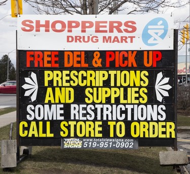 Shoppers Drug Mart on Commissioners Road is offering free delivery and pick up for those in need in London, Ont. on Sunday March 29, 2020. Derek Ruttan/The London Free Press/Postmedia Network