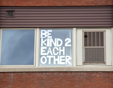 A simple request from an apartment window in St. Thomas, Ont. on Sunday March 29, 2020. Derek Ruttan/The London Free Press/Postmedia Network