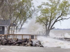 Waves batter the Lake Erie shoreline along Cotterie Park Road in Leamington in this file photo. Structures near the water are at high risk of damage due to weather events, conservation authorities say.