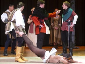 A.B. Lucas secondary school is producing The Trials of Robin Hood, a comedy told from three points of view: Robin Hood, Maid Marion and the Sheriff of Nottingham. As the deer shot by an arrow (Vanessa Whyte) is unceremoniously removed from the stage, the Sheriff of Nottingham (Ben Lord), centre, accuses Robin Hood (Mica Shatil) of the crime. The show runs Tuesday to Friday. (Mike Hensen/The London Free Press)