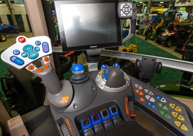 Tractors have come a long way as this Fendt controller shows. It features a joystick for forward and reverse and automatic settings for headland management, plus two cruise control settings, along with pre-sets for RPMs.
Also managed from the cockpit of this $300,000 to $400,000 tractor are the hydraulics, power take off, three-point hitch control, foot pedal mode, auto-steering, front suspension, and locking differentials. The London Farm Show at the Western Fair Agriplex runs till Friday.
Mike Hensen/The London Free Press