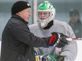 London Knights head coach Dale Hunter, left, uses one word to describe his standout rookie starting goalie, Brett Brochu: "Driven" (Mike Hensen/The London Free Press)