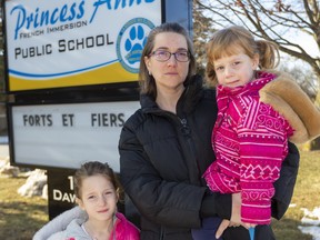 Thames Valley District school board French immersion changes mean Aimee Brewer's daughter, Madeline Clatworthy, 3, may not join her sister, Victoria, 5, at Princess Anne French immersion elementary school near their home for two years after she starts kindergarten. (Mike Hensen/The London Free Press)