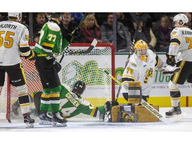 Jonathan Gruden, of the London Knights, was cut after he slid into the skate of Sting goalie Benjamin Gaudreau and was taken to the dressing room during the first period of their OHL game against the Sarnia Sting Friday March 6, 2020, at Budweiser Gardens. Mike Hensen/The London Free Press