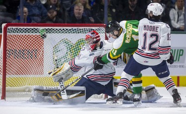 Connor McMichael of the Knights doesn't often come up empty with a gaping net, but Oshawa goalie Jordan Kooy gets his right pad out to stop the Knights goalscorer who is being checked by Lleyton Moore of the Generals in their game at Budweiser Gardens in London. Photograph taken on Sunday March 8, 2020. 
Mike Hensen/The London Free Press/Postmedia Network