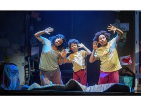 Alexis Gordon as Ma, Quinsley Edison as Jack and Brandon Michael Arrington as SuperJack escape captivity by taking an imaginary flying carpet ride during the Grand Theatre's production of Room, a new stage version of London novelist Emma Donoghue's bestseller. (Mike Hensen/The London Free Press)