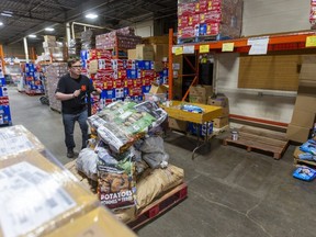 Mike Bloxam the perishable foods manager at the London Food Bank said that in the past couple of weeks they've been getting more food from closed restaurants and wholesalers that service them. (Mike Hensen/The London Free Press)