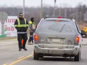 Road blocks have been set up at the Oneida Nation of the Thames. Residents are let through but other motorists are asked to turn around as the community attempts to keep COVID-19 at bay. (Mike Hensen/The London Free Press)