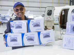 David Taylor, the chief executive and founder of VersaBank in London, Ont. collects 1,000 N95 masks  he was able to purchase and hand off to local "medical professionals." (Mike Hensen/The London Free Press)
