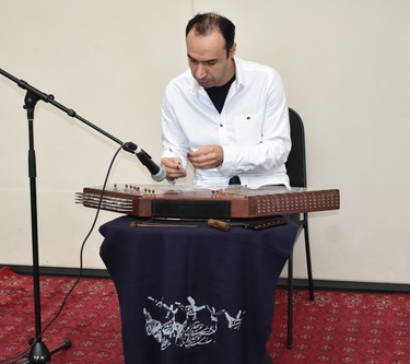 Musician Amin Reihani playing an Iranian santoo provides a mesmerizing pop-up performance at the Aga Khan Museum. Pop-ups feature an array of music played on instruments not often heard in North America. (BARBARA TAYLOR, The London Free Press)
