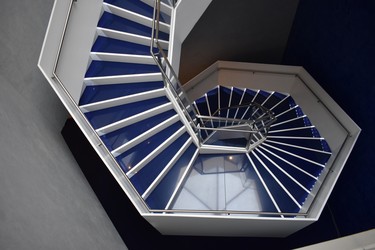 This stunning curved staircase in Aga Khan Museum reflecting the minimalist design of Japanese architect Fumihiko Maki was built by Eventscape. (BARBARA TAYLOR, The London Free Press)