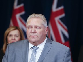 Premier Doug Ford , Christine Elliott, Deputy Premier and Minister of Health, and Rod Phillips, Minister of Finance update about the  state of emergency amid coronavirus pandemic on Wednesday March 18, 2020. Veronica Henri/Toronto Sun/Postmedia Network