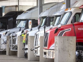 Truckers fill up at the Flying J near London on Wednesday. Drivers are reporting much less traffic on the area's highways but have voiced other concerns. Please see the story on page A3. Mike Hensen/The London Free Press/Postmedia Network