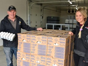 Egg farmer Dan Veldman and his daughter Megan, the farm manager at Veldman Poultry Farms, are among many egg farmers in the region who are trying to place surplus eggs on the shelves of food banks and other organizations who can use them. (Galen Simmons, Beacon Herald)