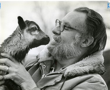 Storybook Gardens zookeeper Bill Clarke with a Barbados lamb, 1982. (London Free Press files)