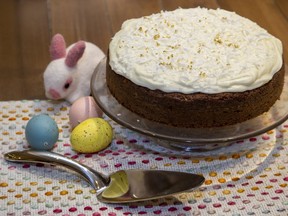 Judy's carrot cake, frosted with cream cheese icing and garnished with coconut, makes a delicious Easter dessert. (Derek Ruttan/The London Free Press)
