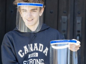 Fifteen-year-old Callum Thompson is using his 3D printer to make face shields for medical professionals in London. (Derek Ruttan/The London Free Press)