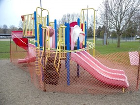 Authorities have taken measures to ensure that no one uses playground equipment. A Free Press reader says there needs to be better signage at the entrances to local parks. (Derek Ruttan/The London Free Press)