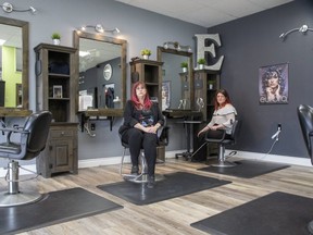 Nikkie Dietze, left, and Angela Gagie co-own Essence Salon in London, Ont. They have been closed since March 17, 2020. (Derek Ruttan/The London Free Press)