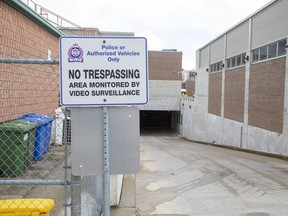 A ramp leads to an underground parking garage at London Police headquarters. (Derek Ruttan/The London Free Press)