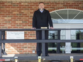 Pastor Henry Hiledebrandt will be using a trailer as a stage as he delivers the Sunday sermon at The Church of God in Aylmer, Ont. this weekend. Derek Ruttan/The London Free Press/Postmedia Network