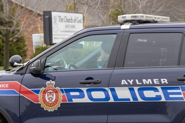 Police were keeping an eye on the Church of God  in Aylmer, Ontario on Sunday April 26, 2020. In defiance of an order by the town's chief of police, the church held a drive-in service Sunday morning. Hundreds of parishioners sat in parked vehicles watching Hildebrandt on stage and listening to his sermon over their FM radios. Police video taped the event but have not yet laid charges. Derek Ruttan/The London Free Press/Postmedia Network